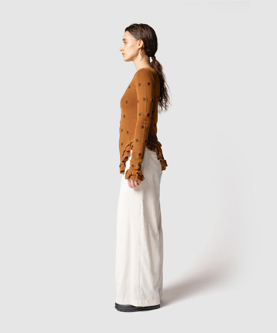 CREST EMBROIDERY FRILLED TOP
